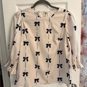 Cream Blouse with Black Bow Pattern